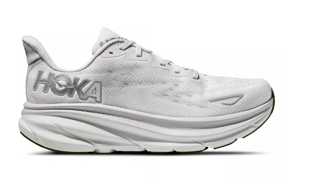 a white Hoka running shoe featuring a sleek design with a thick cushioned sole for maximum comfort and performance.