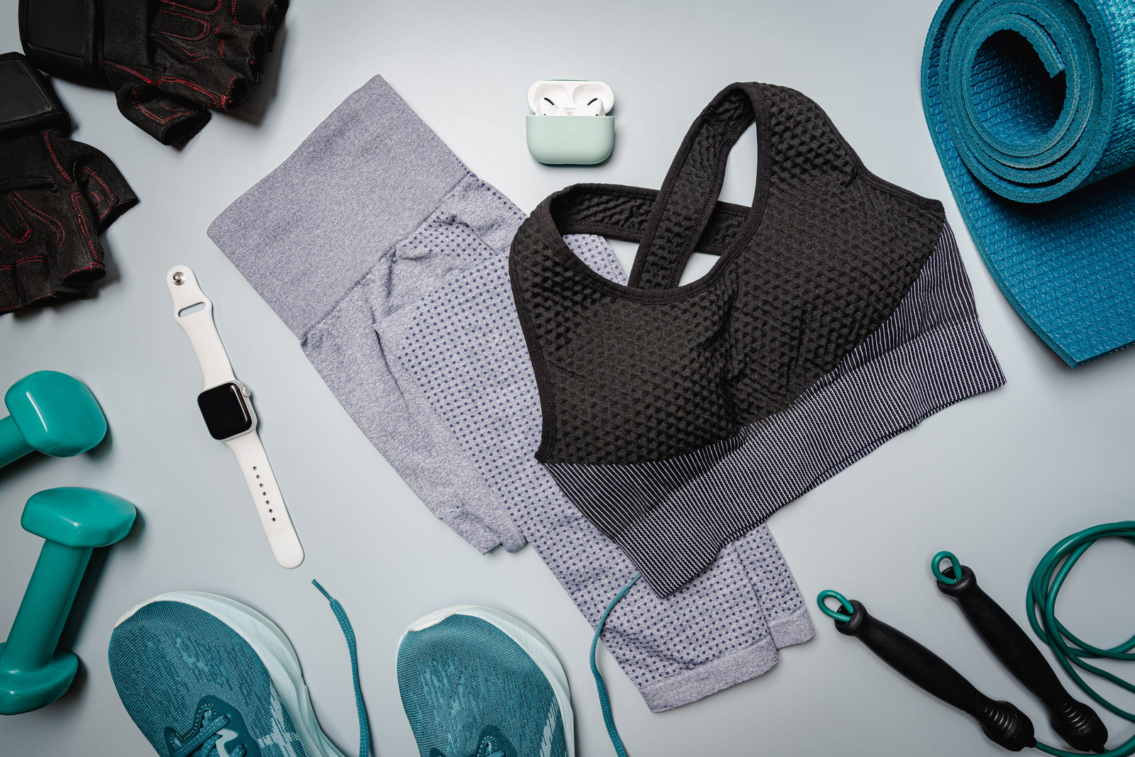 New women's gym apparel for newbies laid out on the floor