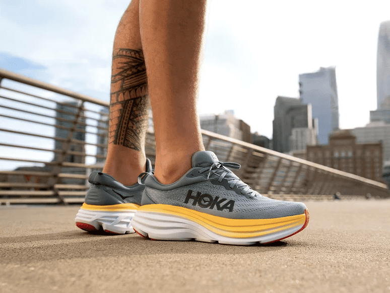 A man wearing the best Hoka shoes for running