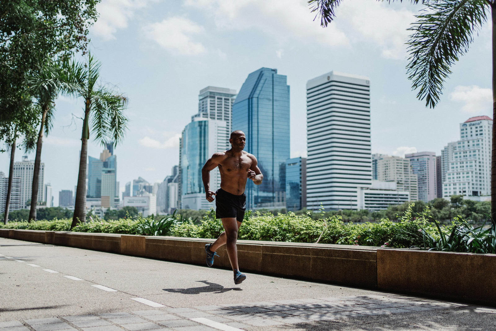Male runner on a road in the city