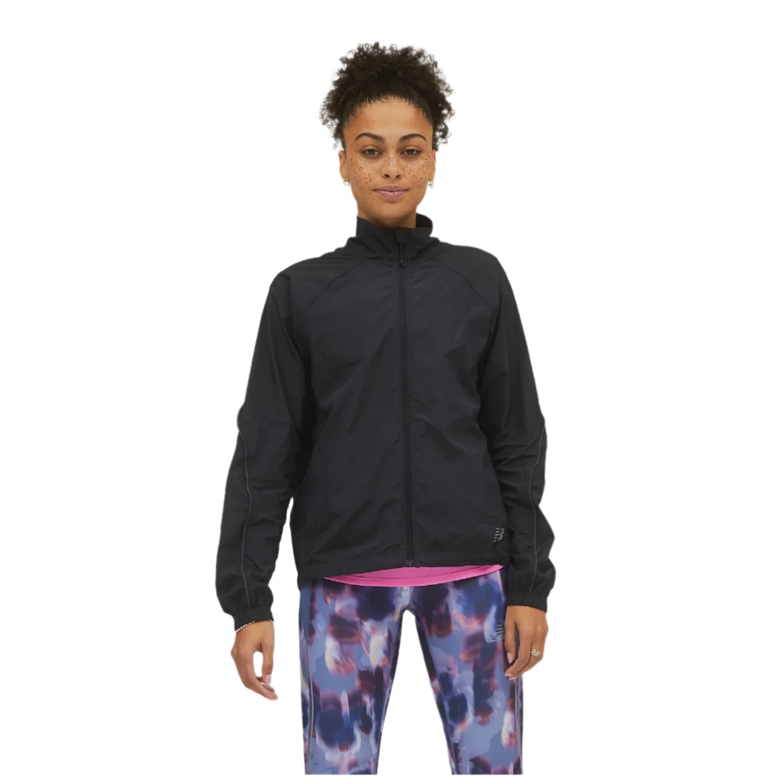 Woman wearing a lightweight black zip-up women's jacket with a high collar 